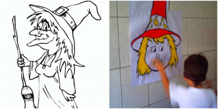 Criança colando desenho de colorir de bruxa em parede